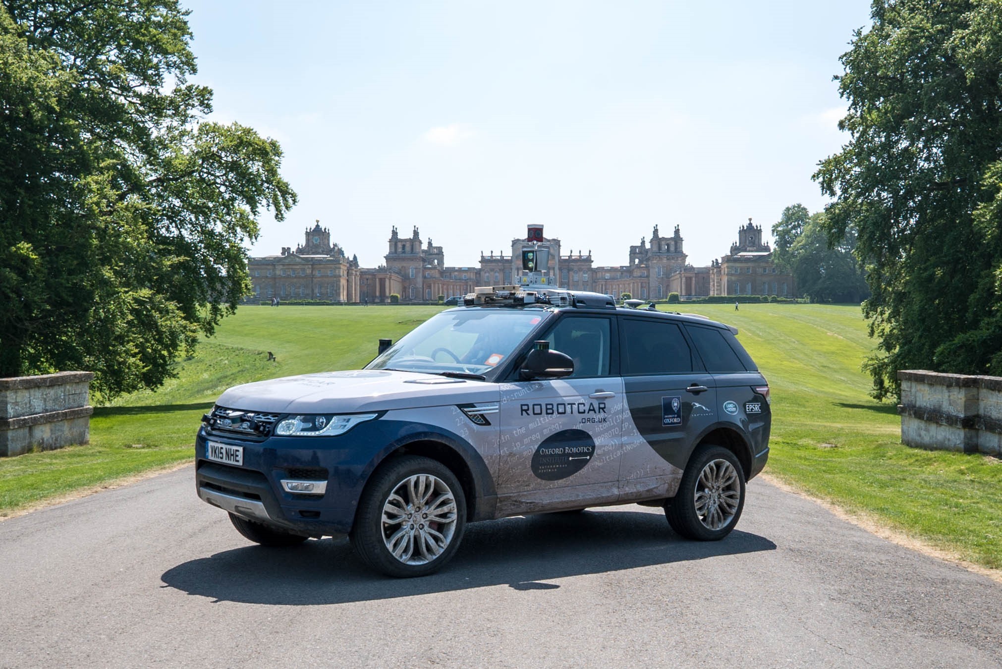 Oxford Robotics Institute vehicle on drive with Blenheim Palace in background